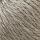 Close-up image of Cascade Eco and Cascade Eco Plus Wool Yarn by Cascade Yarns in beige or light brown, showcasing the texture and fibers intertwined in a slightly rough pattern. The thick strands, made of Peruvian Highland wool, appear soft and are perfect for knitting or crafting projects.